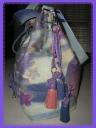 Sac pompons et oeillets